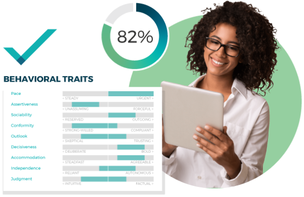 Woman viewing her PXT Select assessment results with a close-up graph of her behavioral traits results